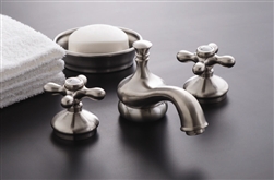 Strom Plumbing P0140M - Sacramento Matte Nickel Widespread Lavatory Faucet with Metal Cross Handles and Pop-Up Drain. The metal cross handles have a porcelain button for hot and cold.