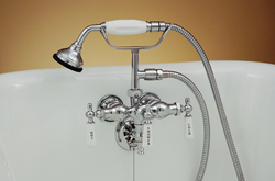 Strom Plumbing P0154 - Leg Tub Faucet with Handheld Shower. The P0154 mounts at 3-3/8” centers for use with almost any tub on legs