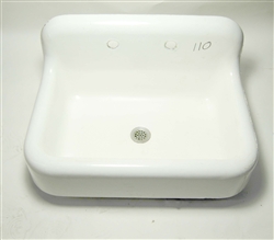 This is an original Kohler 20x30 inch cast iron sink with backsplash. The faucet holes are drilled at 8-inch on center.