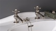 Strom Plumbing - P0012M Matte Nickel Antique Reproduction Individual Basin Faucets with Cross Handles. The P0012 metal cross handles have porcelain buttons for hot and cold.
