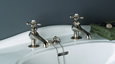 Strom Plumbing - P0012N Polished Nickel Antique Reproduction Individual Basin Faucets with Cross Handles. The P0012 metal cross handles have porcelain buttons for hot and cold.L