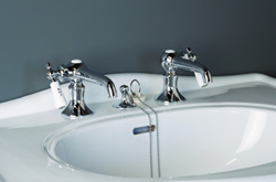Strom Plumbing - P0058C Polished Chrome Antique Reproduction Individual Basin Faucets with Side Mounted Porcelain Lever Handles. The P0058C porcelain lever handles indicate hot and cold.