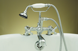 Strom Plumbing P0341C Polished Chrome Deck Mount Faucet with metal cross handles and 7” centers. The P0341 metal cross handles have porcelain buttons for hot and cold.