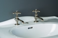 Strom Plumbing - P0463N Polished Nickel Antique Reproduction Individual Basin Faucets with 5-Point Cross Handles. The P0463 metal cross handles have porcelain buttons for hot and cold.