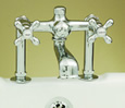 Strom Plumbing - P0802C Polished Chrome Deck Mount Tub Fill Only Faucet with Metal Cross Handles. The P0802 cross handles have porcelain buttons for hot and cold.