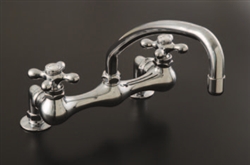 Strom Plumbing - P0826C Bridge Style 8 inch Center Deck Mount Kitchen Faucet with Arched Spout and Cross Handles. The P0826C has metal cross handles with porcelain buttons for hot and cold.