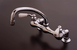 Strom Plumbing P1011C - Chrome Deck Mount Kitchen Faucet, 8 inch centers, porcelain handles